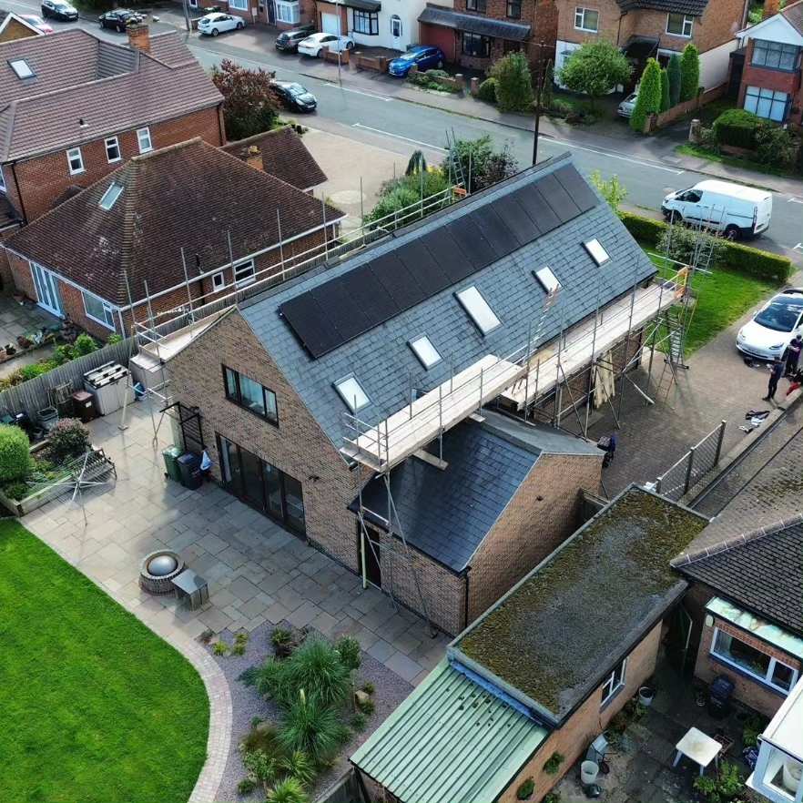 Residential solar panels being installed on a UK home